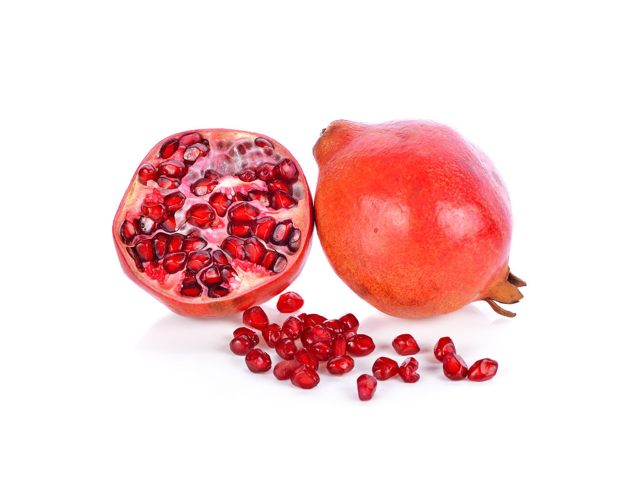 HIGH ANGLE VIEW OF RED FRUITS AGAINST WHITE BACKGROUND