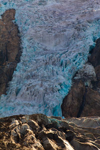 Rock formations on frozen landscape