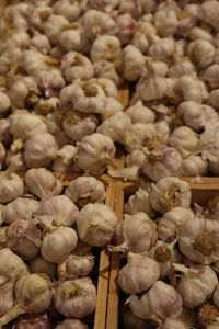 Full frame shot of onions for sale in market