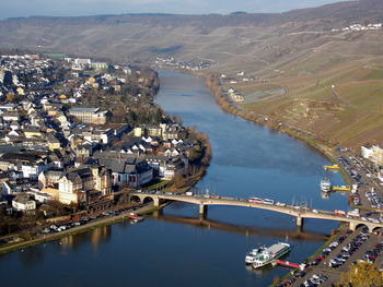 High angle view of river amidst buildings in city