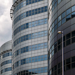 Low angle view of modern buildings against sky