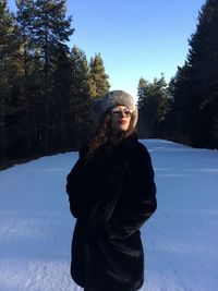 Portrait of young woman standing on snow covered field
pirin mountain, february 2020. 