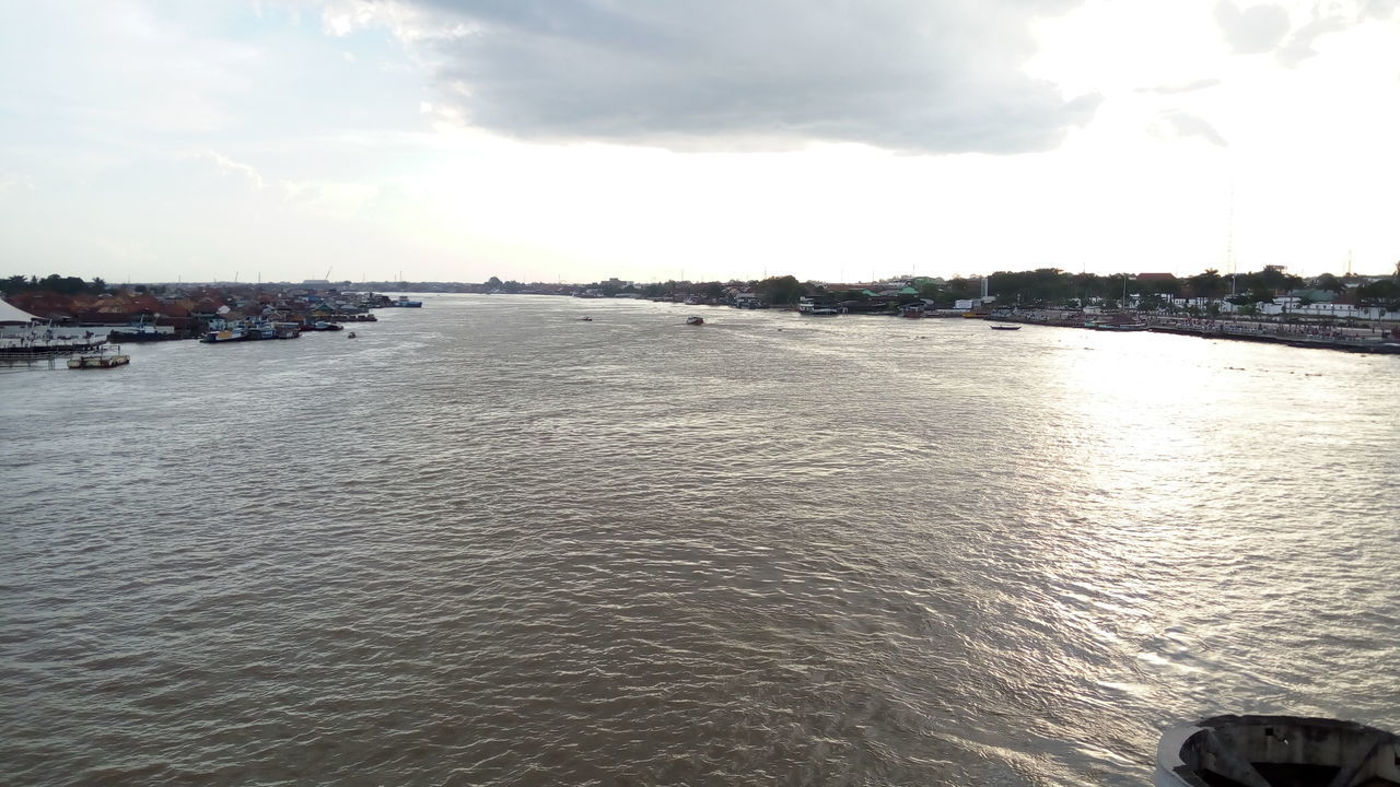 PANORAMIC VIEW OF SEA AGAINST SKY IN CITY