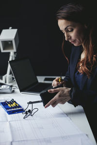 Woman working on table