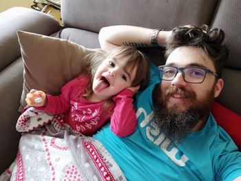 Portrait of mother and daughter at home