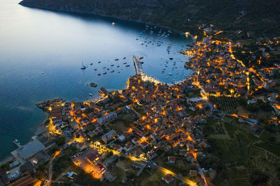 High angle view of river amidst buildings in city