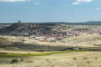 Scenic view of landscape against blue sky