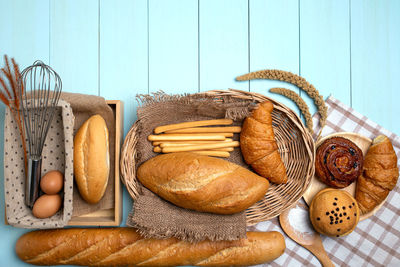 Various food in basket on table