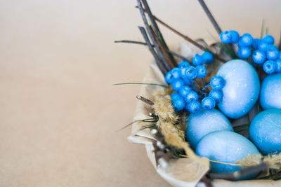 Close-up of eggs on blue table