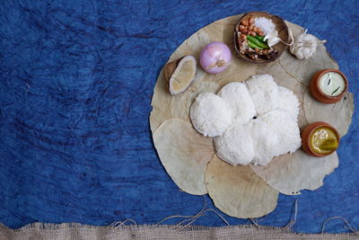 High angle view of mushroom growing on wooden table