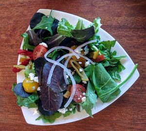 High angle view of vegetables in plate on table