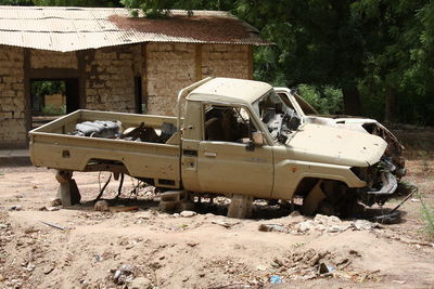 Abandoned truck on field