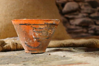 Close-up of rusty clay pot
