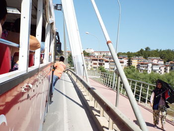 People traveling in bus on zeynel senol bridge