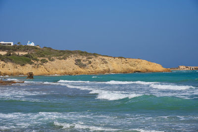 Scenic view of sea against clear sky