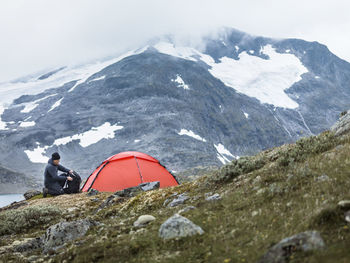 Hiker looking at mountains