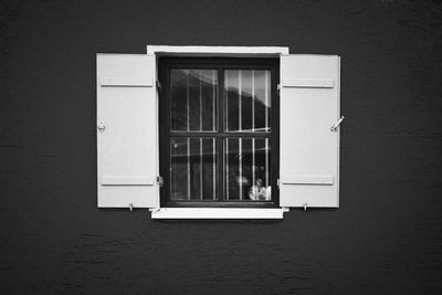 Close-up of window on wall of building