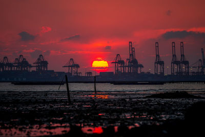 Scenic view of pier against sky during sunset