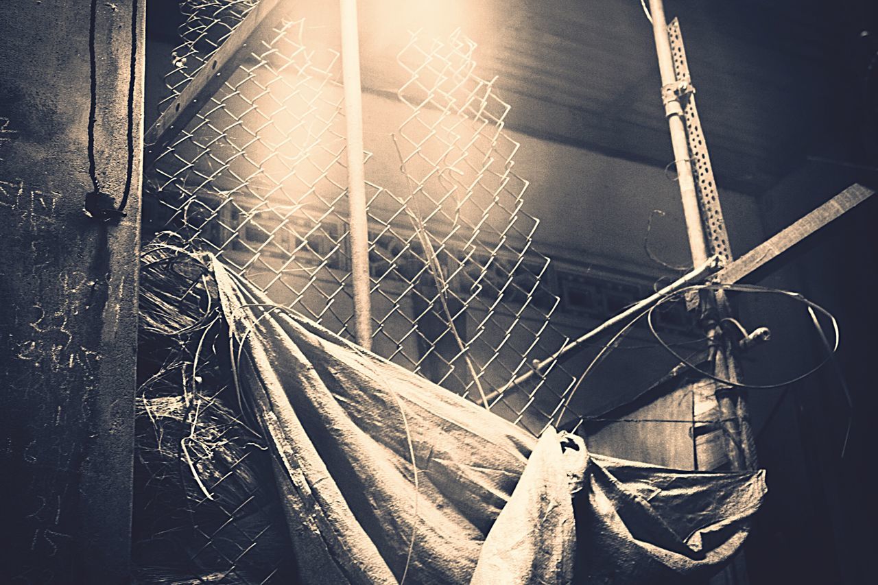 transportation, metal, the way forward, diminishing perspective, bicycle, close-up, outdoors, day, no people, mode of transport, part of, sunlight, vanishing point, rope, protection, absence, safety, metallic