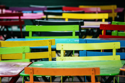 Close-up of empty chairs and table