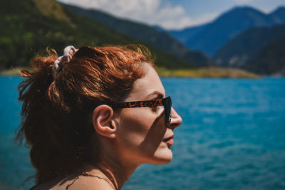 Portrait of young woman wearing sunglasses