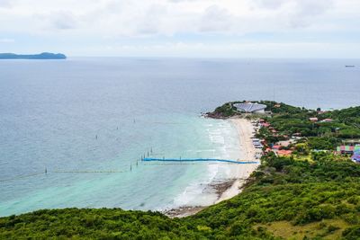High angle view of swimming pool by sea against sky