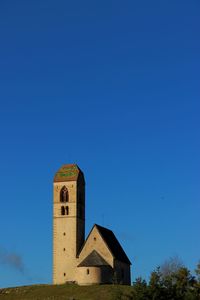 Church against clear blue sky