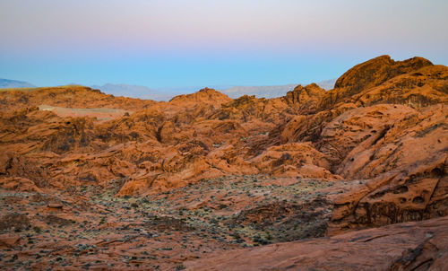 Scenic view of rocky mountains against clear sky