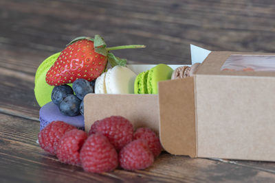 Close-up of strawberries in box on table