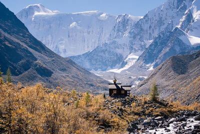 Scenic view of snowcapped mountains against sky