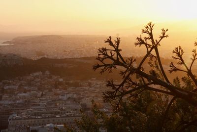 Scenic view of landscape against sky during sunset