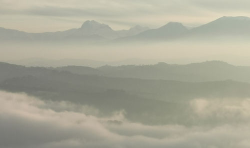 Scenic view of mountains against sky during sunset