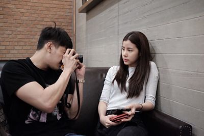 Portrait of teenage girl using smart phone