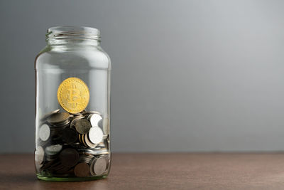 Close-up of glass jar on table