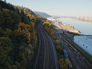 High angle view of road by bridge against sky