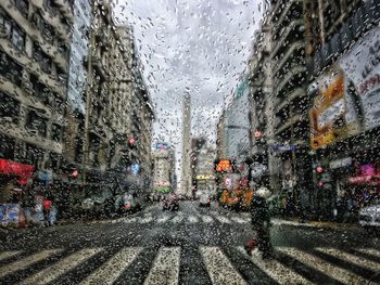 Wet street in city during rainy season