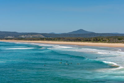 Scenic view of sea against clear blue sky