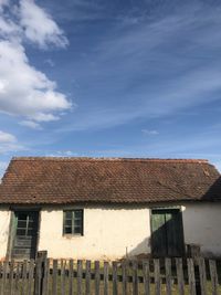 Low angle view of old building against sky