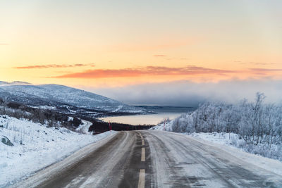 Road against sky during winter