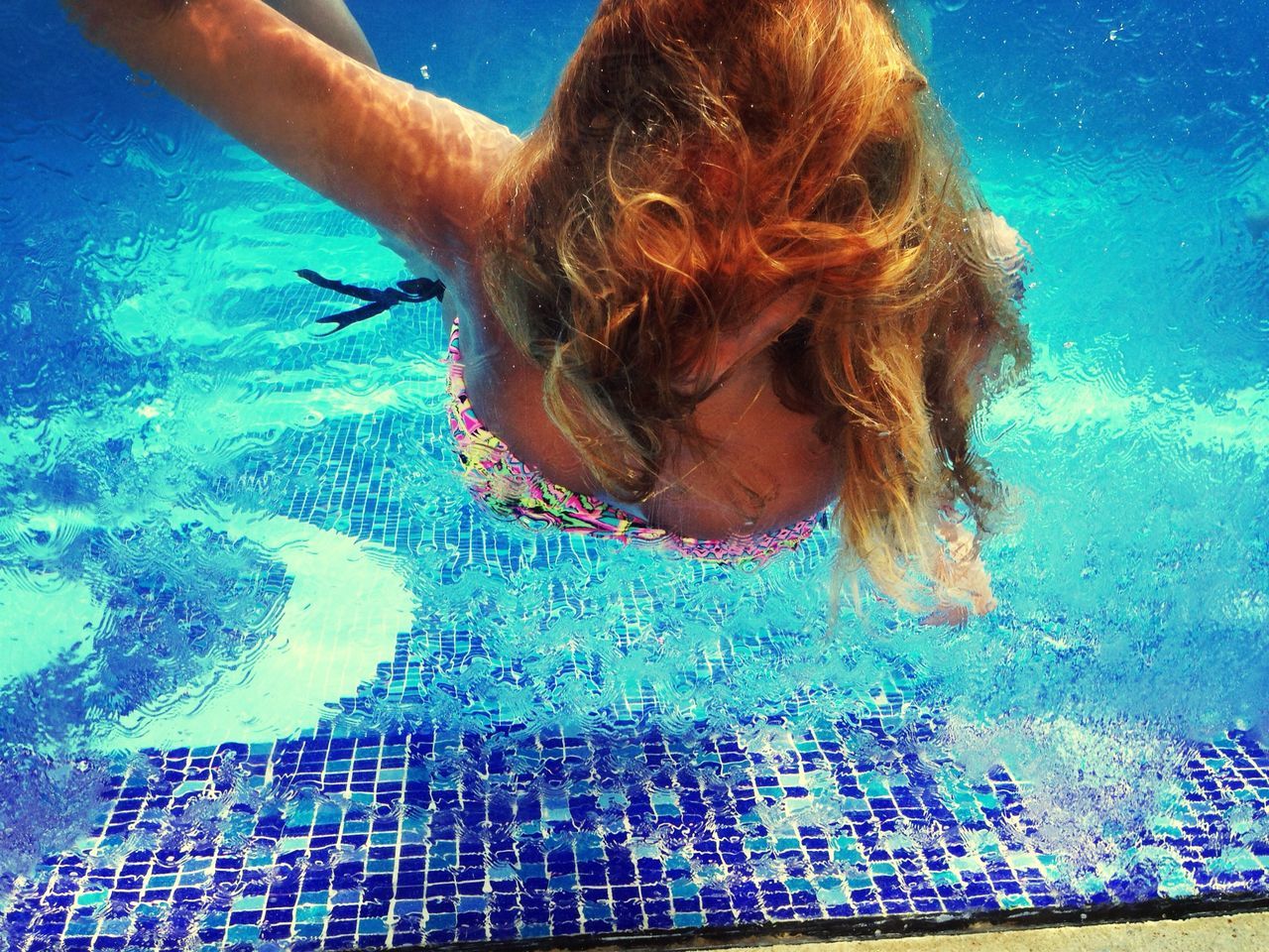 blue, swimming pool, leisure activity, lifestyles, water, turquoise colored, childhood, person, girls, standing, headshot, long hair, underwater, day, blond hair, elementary age, full length