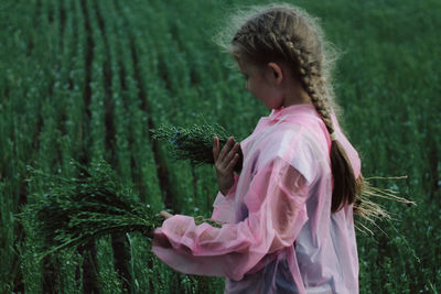 Girl standing on field