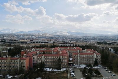 High angle shot of townscape against sky