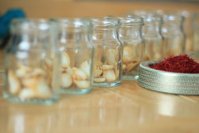 Close-up of glass jar on table