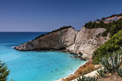 Scenic view of sea against clear blue sky