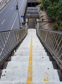 High angle view of railings on road in city