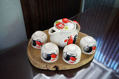 High angle view of coffee cups on table