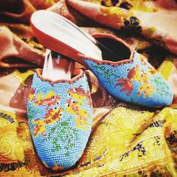 High angle view of multi colored shoes for sale