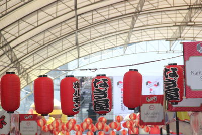 Low angle view of lanterns hanging on ceiling