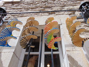 High angle view of multi colored umbrellas at market