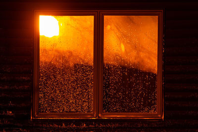 Sunlight falling on glass window of building